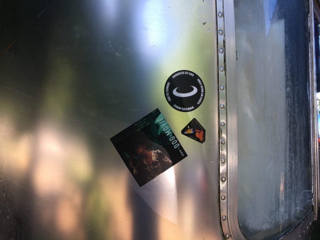 A podcast about movie making and the scifi featurette, Daughter of God, with Director Shri Fugi Spilt, (Dan Kelly). Episode 043 Blessings, (stickers). Sticker deployment on the 1972 Airstream Globtrotter that Keanu Reeves has not yet moved into.